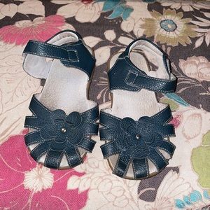 Girls Navy leather sandals with Flower and Velcro closures